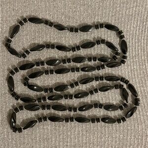 Vintage long black beaded necklace